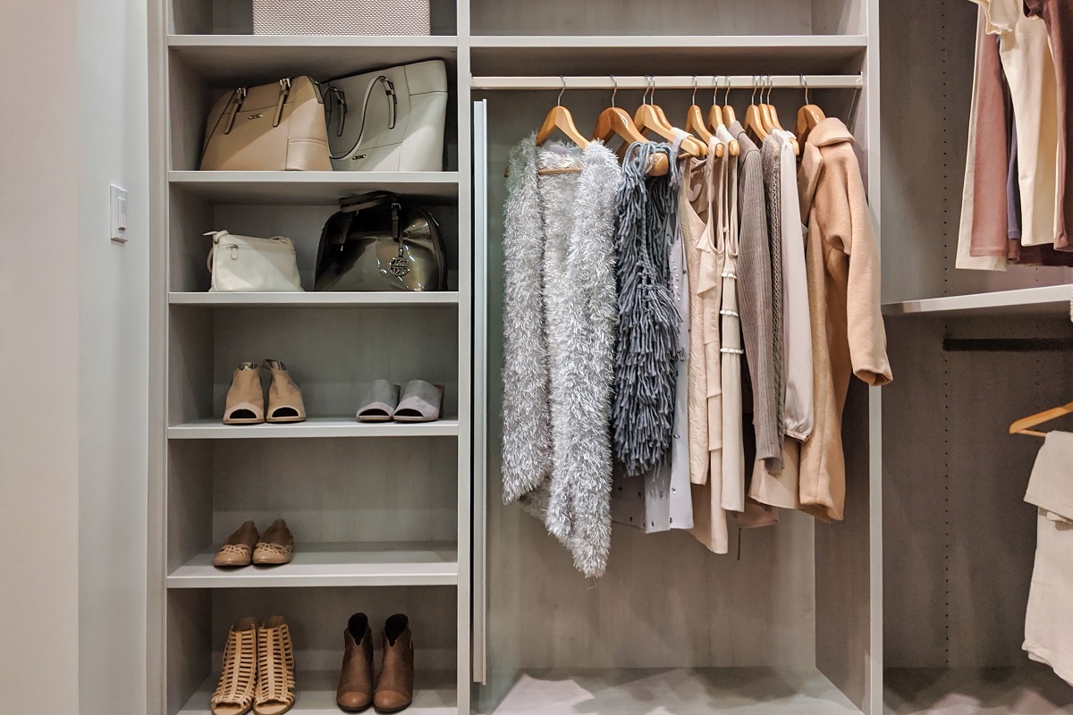 Clutter Monkey organised walk in wardrobe